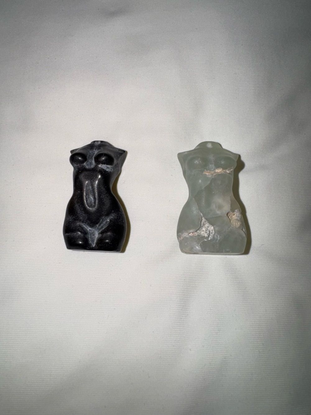 Carved obsidian and fluorite Female Torso Sculptures